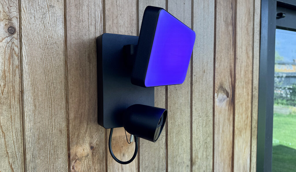 Philips Hue Secure Floodlight Camera purple on side